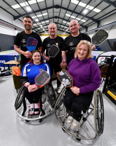 Two wheelchair players, 1 para standing and 2 non disabled players
