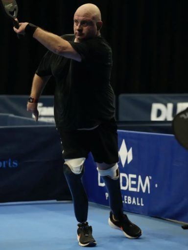 Mark Fosbrook Serving a Pickleball